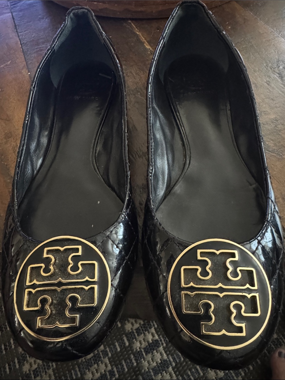 Tory Burch Black Ballet Flats with Gold Logo Emblems